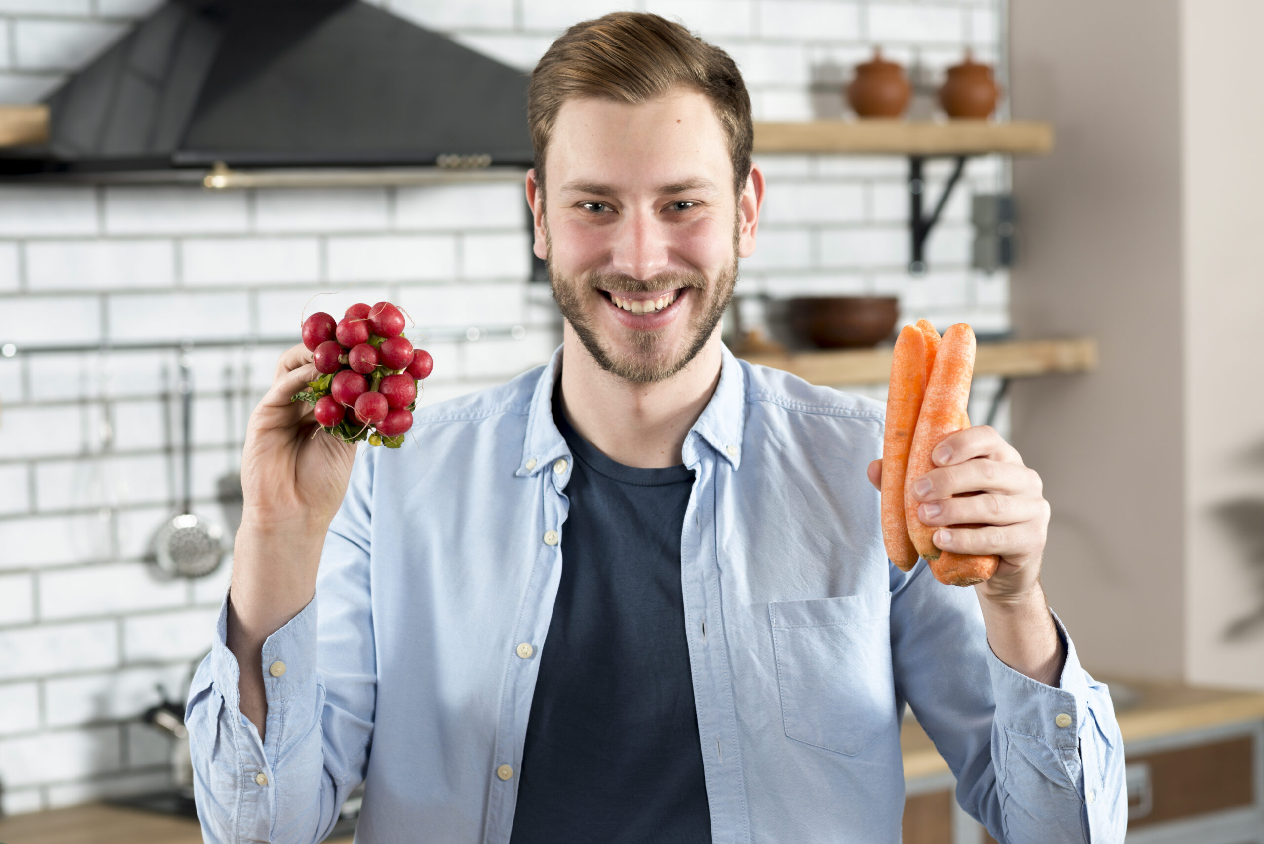 Smiling man eating healthy food, representing Nutrition Gum Disease Beverly Hills prevention.